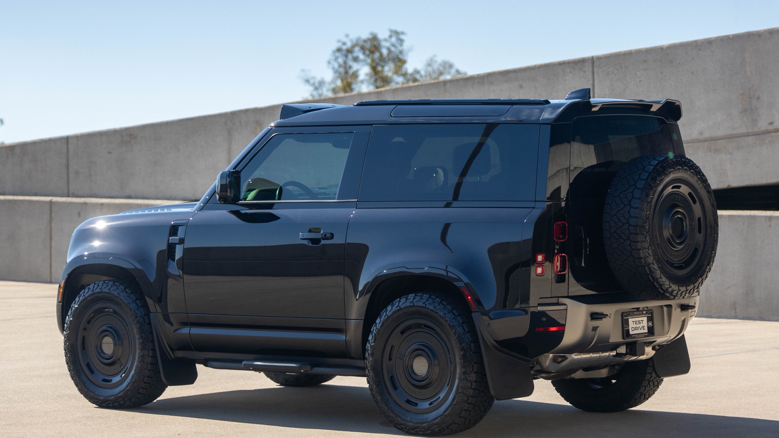 Artemis Adventure Defender parked on the road